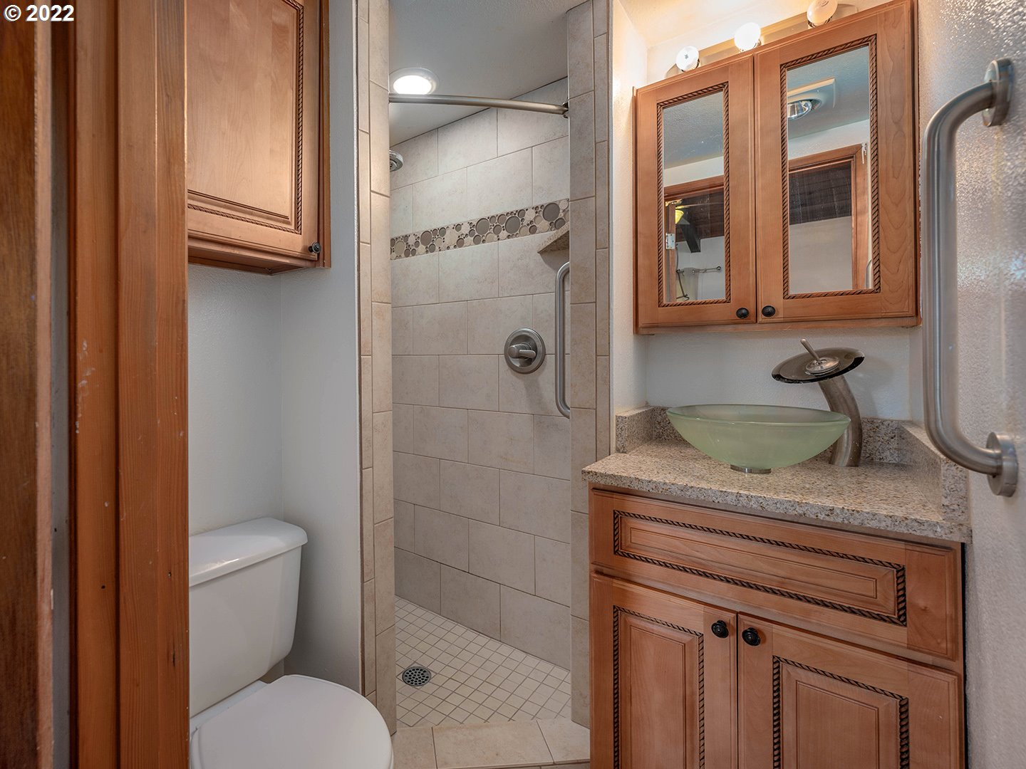 72293 Lentz Road Rainier, OR 97048 - Photo 13 of 22 a bathroom with a granite countertop toilet sink and shower