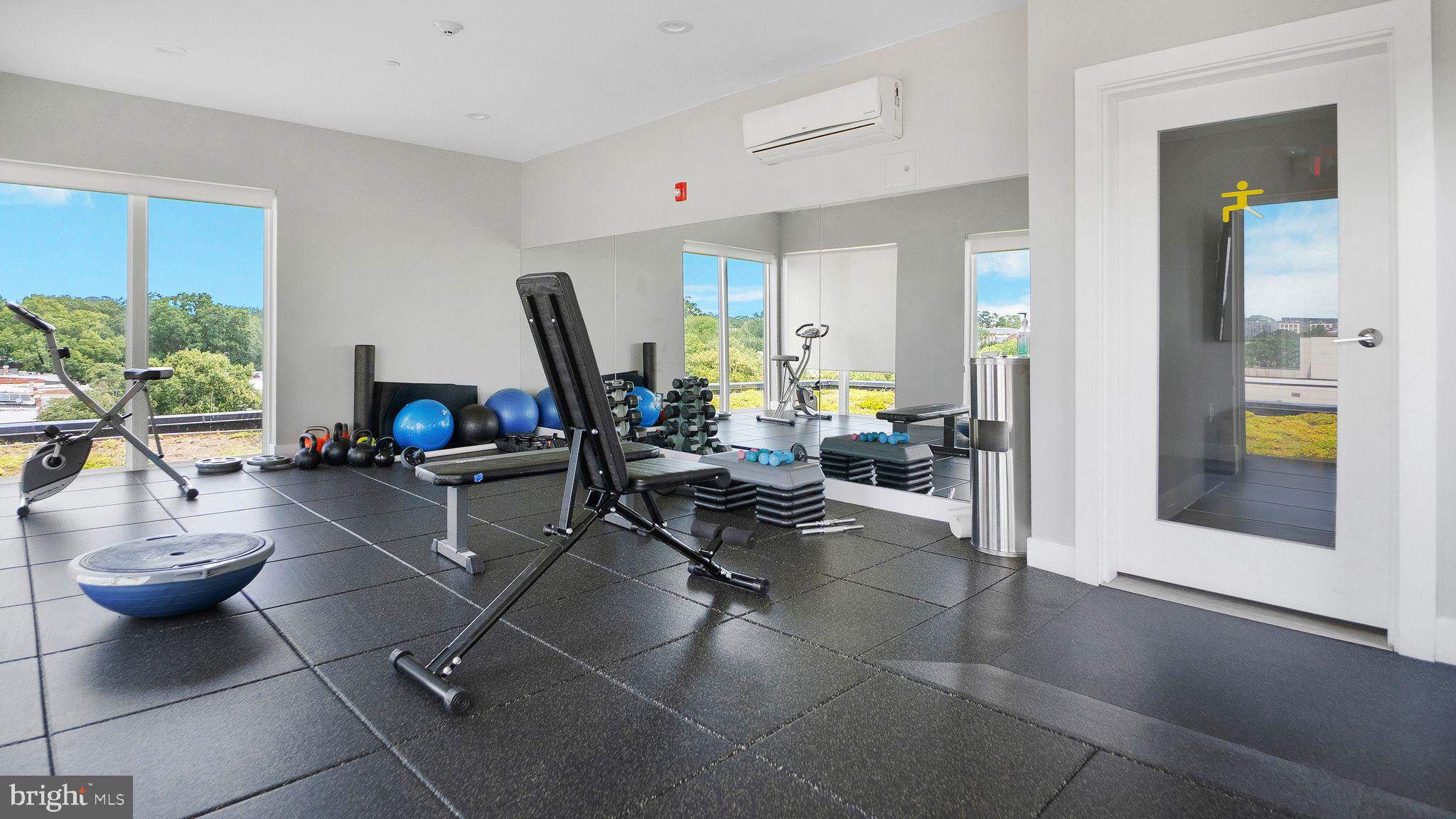 1111 Orren Street Northeast, Unit 407 Washington, DC 20002 - Photo 15 of 19 a living room filled with furniture