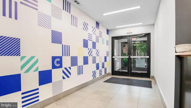 a view of an entryway with a rug