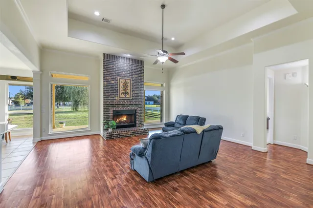 a kitchen with a stove top oven and refrigerator