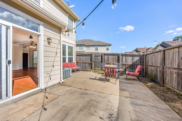 a view of a terrace with sitting area