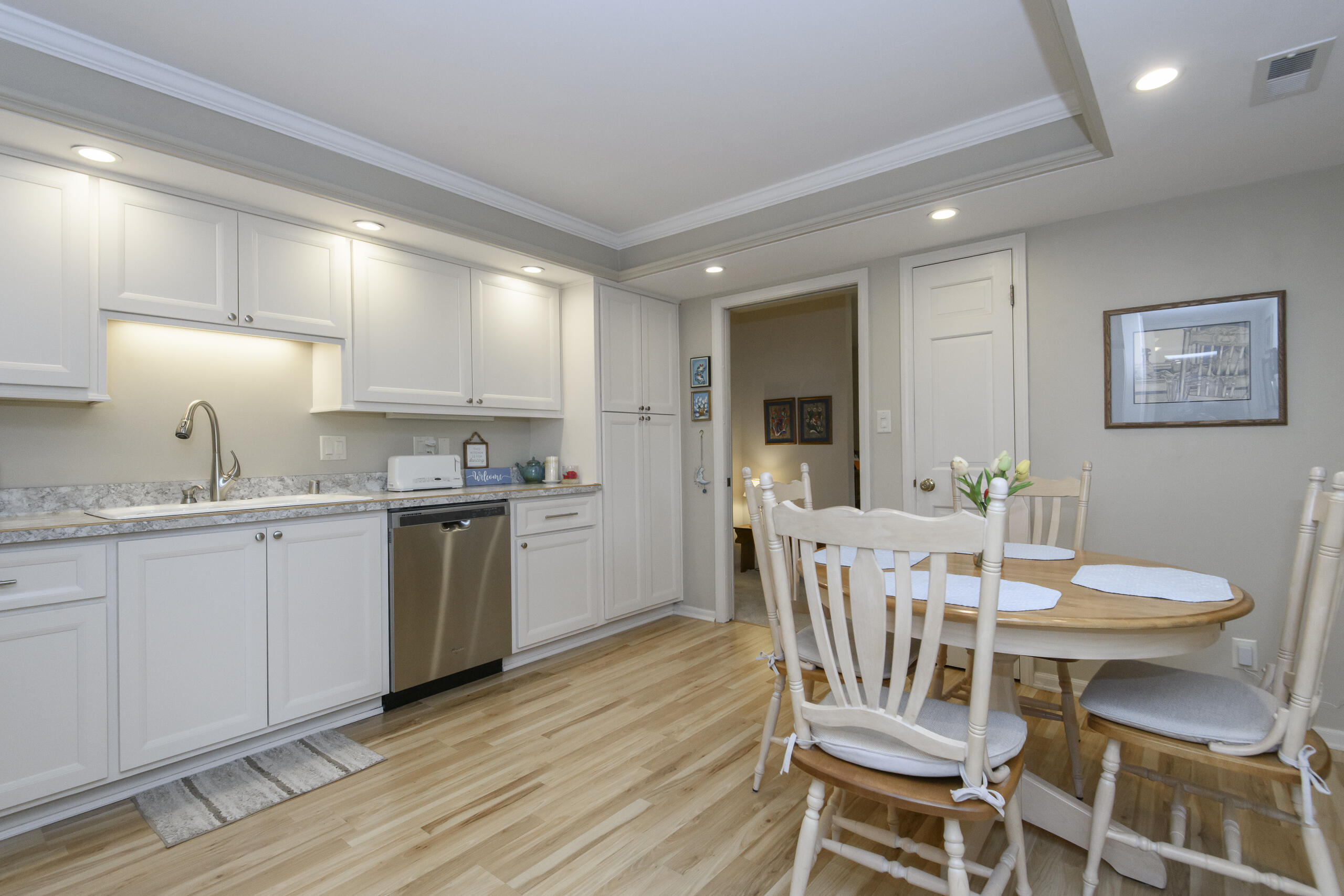 13335 Watertown Plank Road, Unit 109 Elm Grove, WI 53122 - Photo 7 of 25 Open and efficient Kitchen space