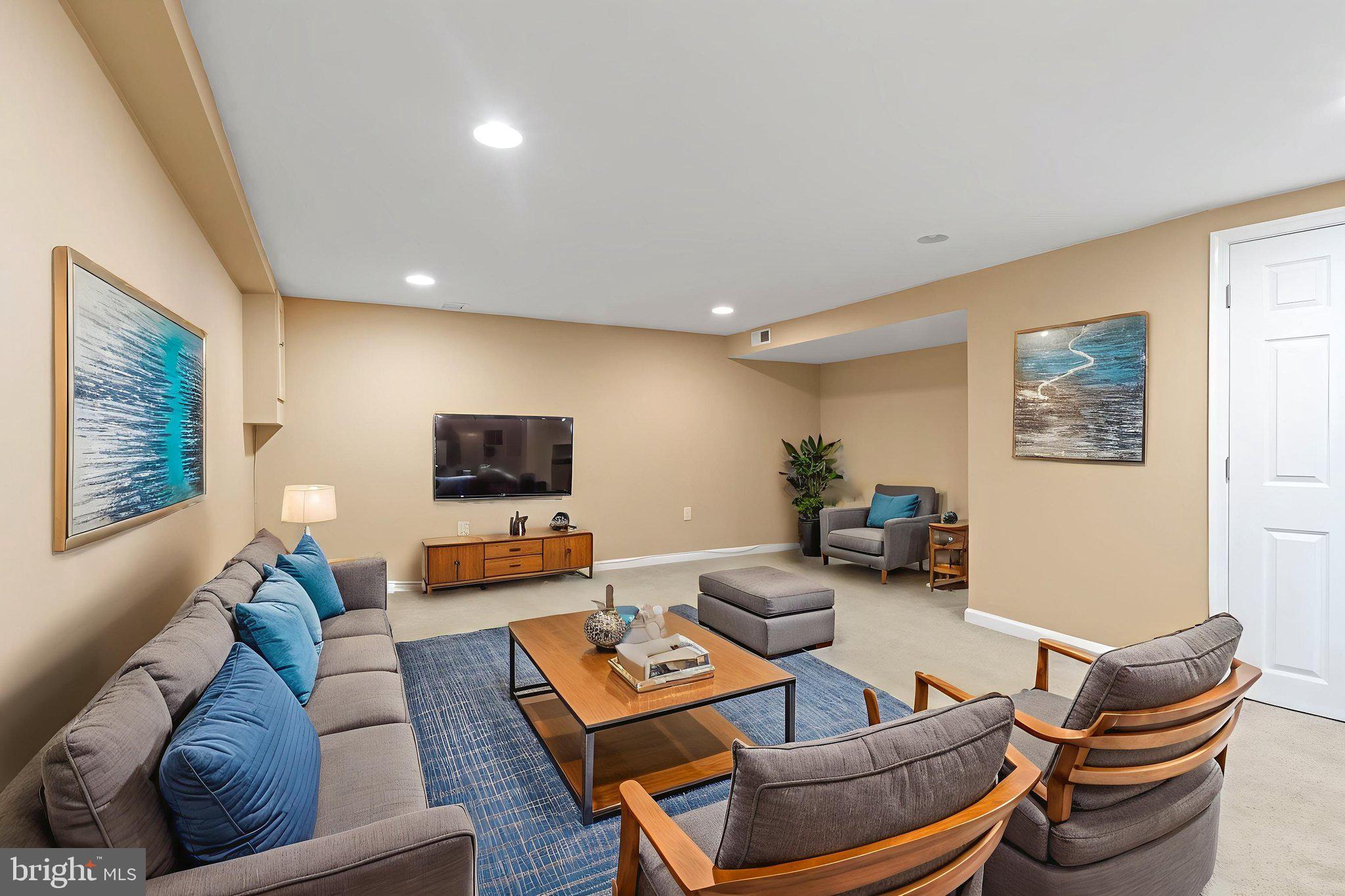 4274 Lawnside Road Philadelphia, PA 19154 - Photo 16 of 20 a living room with furniture and a flat screen tv