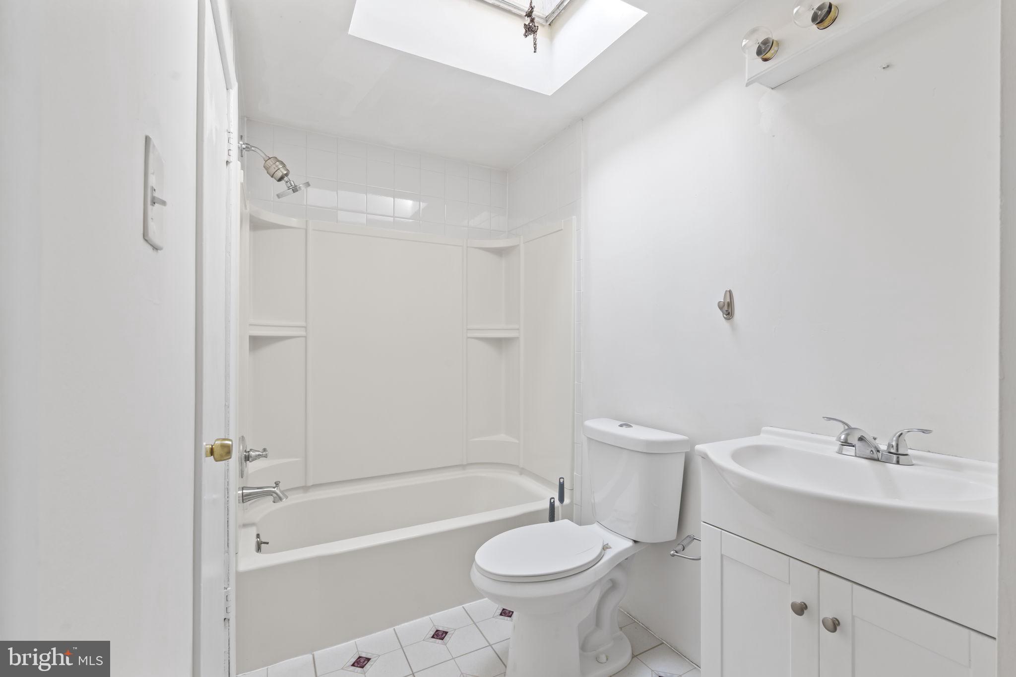 4274 Lawnside Road Philadelphia, PA 19154 - Photo 10 of 20 a bathroom with a sink a toilet and shower