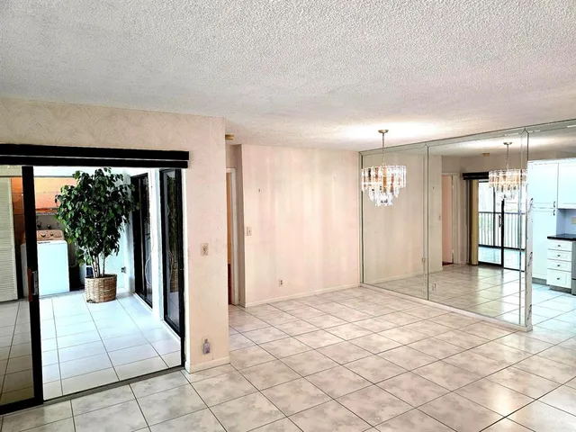 a view of a livingroom with a staircase
