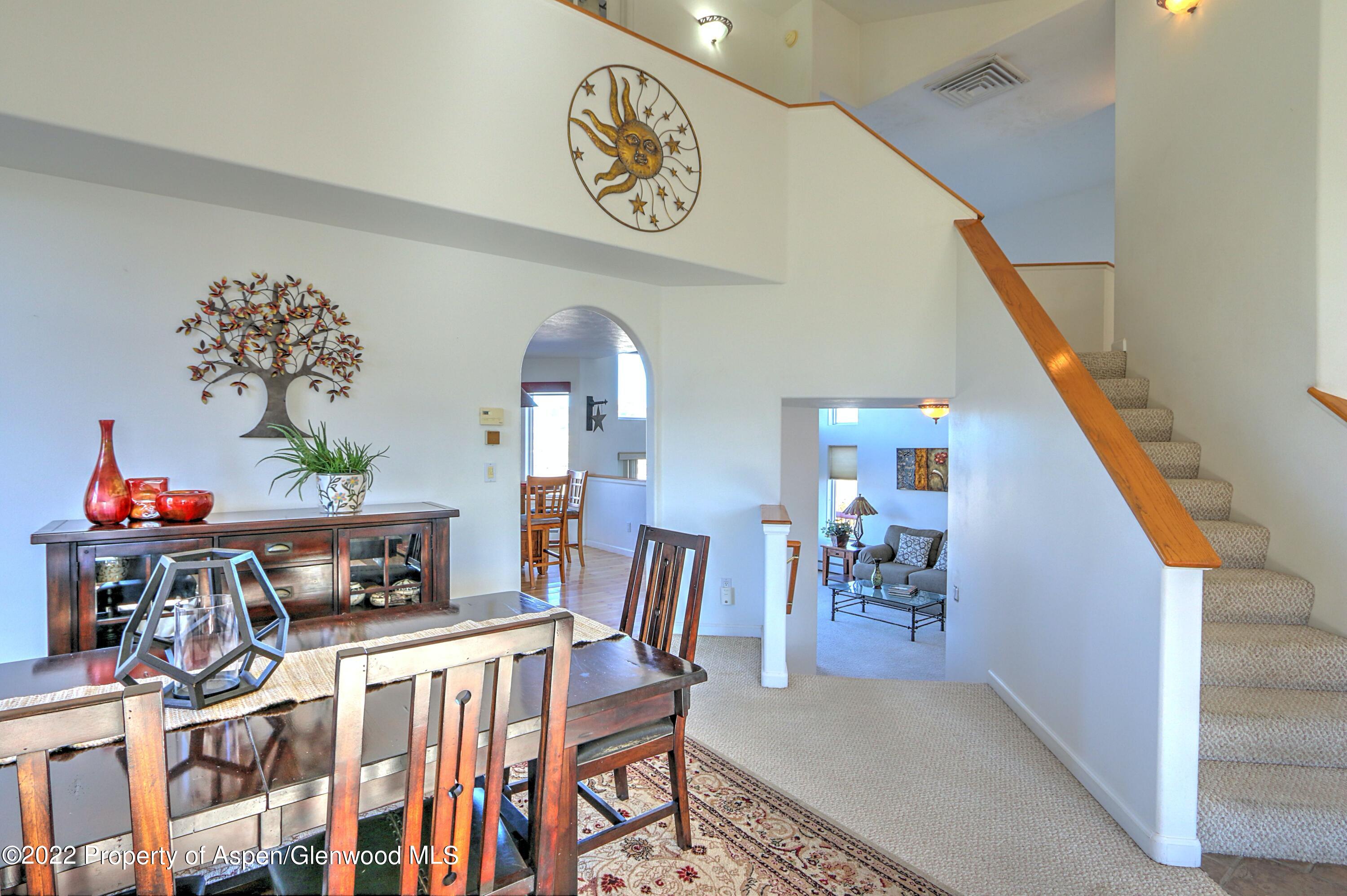 1220 Sage Court Rifle, CO 81650 - Photo 11 of 41 a view of a dining room with furniture