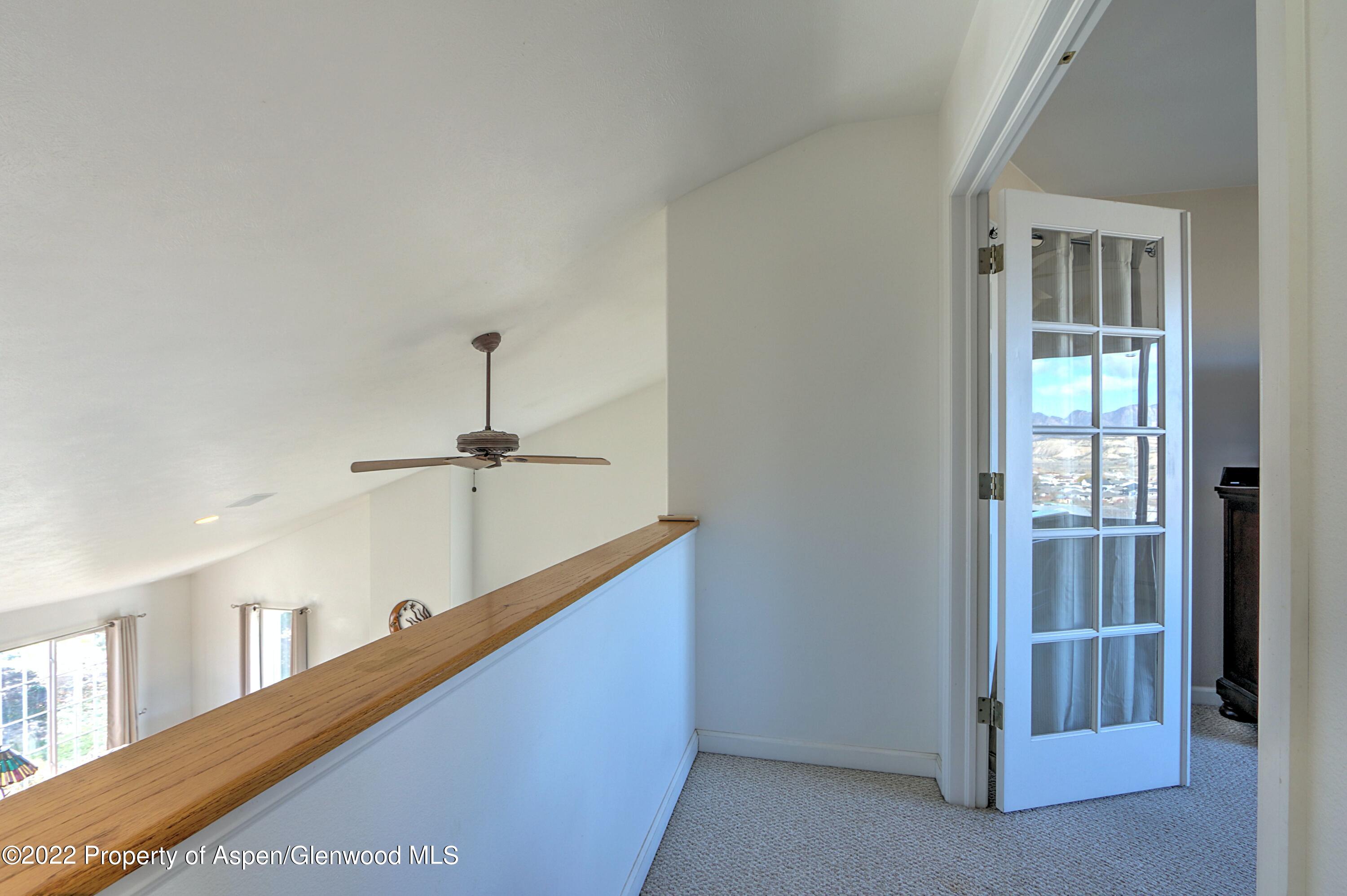 1220 Sage Court Rifle, CO 81650 - Photo 22 of 41 a view of a hallway with entryway