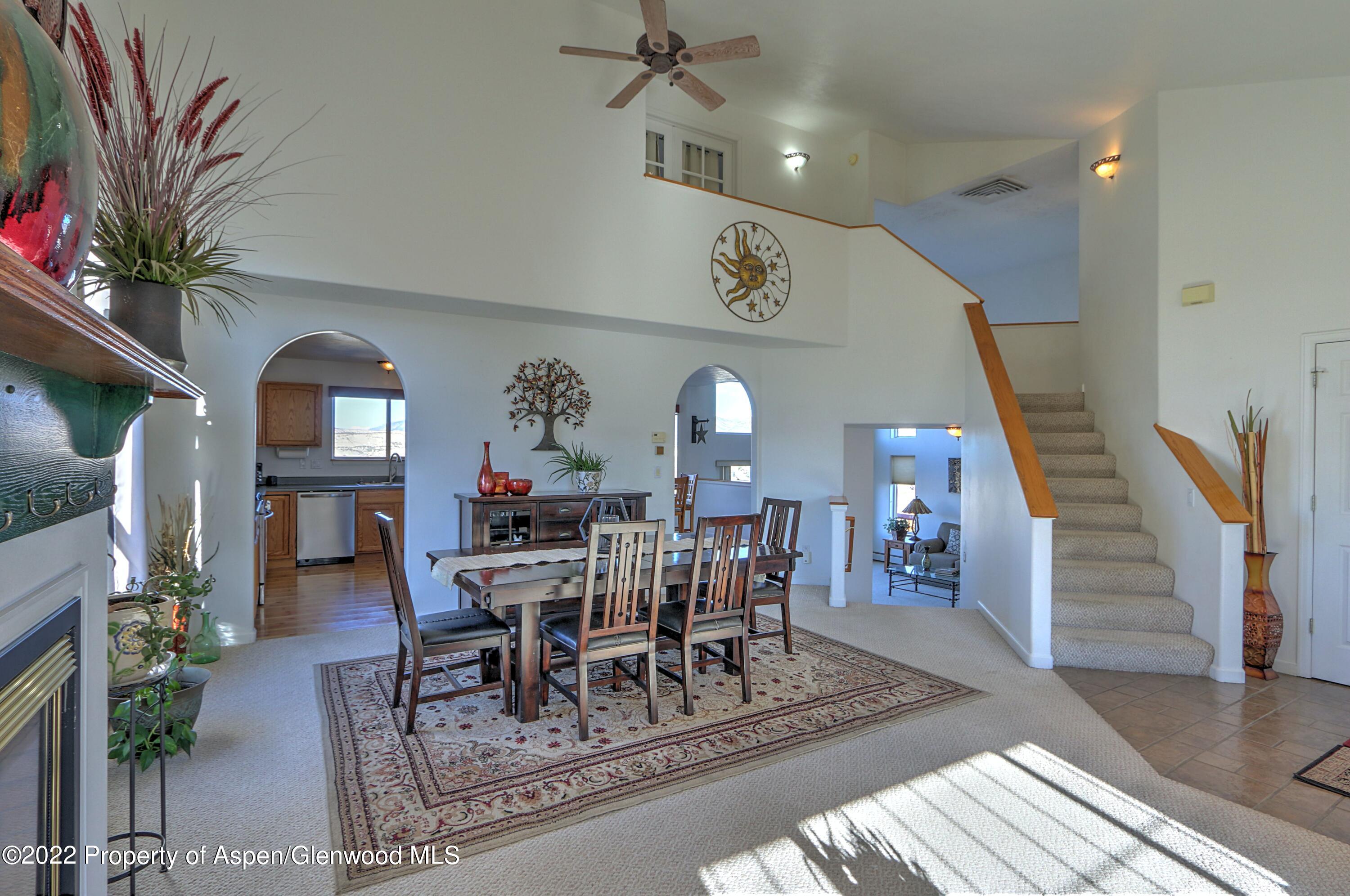 1220 Sage Court Rifle, CO 81650 - Photo 9 of 41 a view of a livingroom and dining room