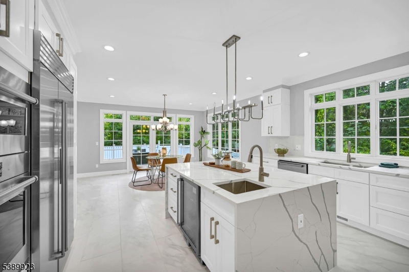 466 White Oak Ridge Road Short Hills, NJ 07078 - Photo 20 of 49 a kitchen with a sink stove and refrigerator