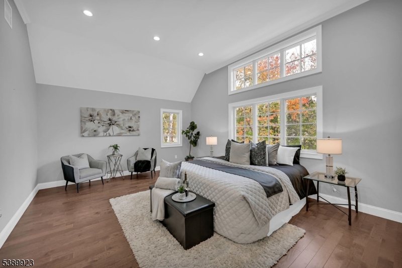 466 White Oak Ridge Road Short Hills, NJ 07078 - Photo 24 of 49 a bedroom with a bed and wooden floor