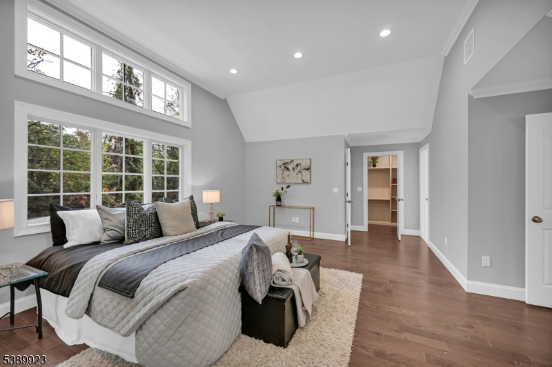 466 White Oak Ridge Road Short Hills, NJ 07078 - Photo 25 of 49 a bedroom with a large bed and a large window