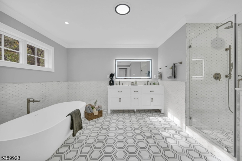 466 White Oak Ridge Road Short Hills, NJ 07078 - Photo 27 of 49 a bathroom with a bathtub and a shower