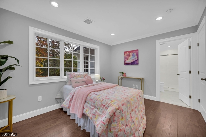 466 White Oak Ridge Road Short Hills, NJ 07078 - Photo 28 of 49 a bedroom with a large bed and a window