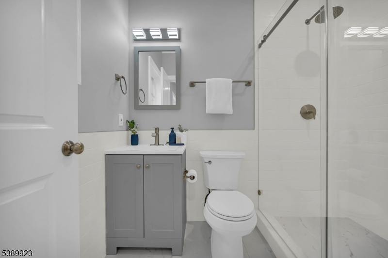 466 White Oak Ridge Road Short Hills, NJ 07078 - Photo 33 of 49 a bathroom with a sink toilet and shower