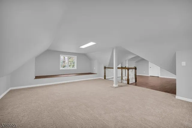 a view of a livingroom with wooden floor