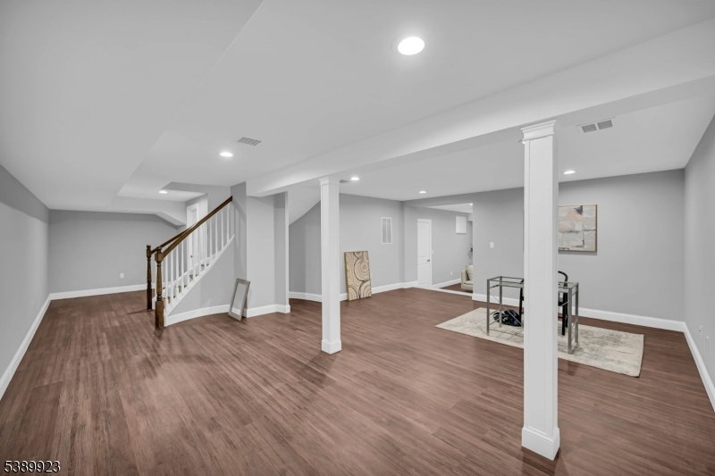 466 White Oak Ridge Road Short Hills, NJ 07078 - Photo 38 of 49 a view of an empty room with wooden floor