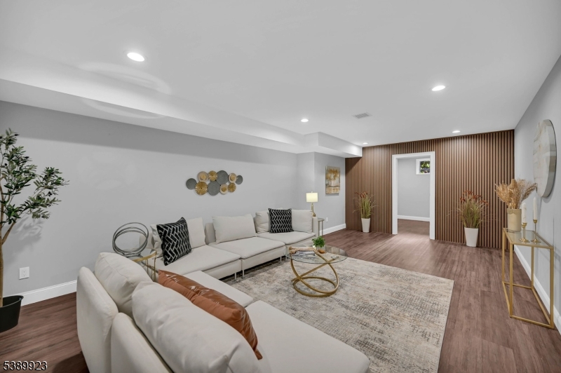 466 White Oak Ridge Road Short Hills, NJ 07078 - Photo 40 of 49 a living room with furniture and wooden floor