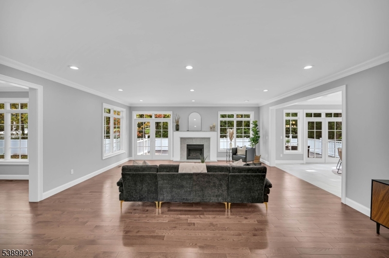 466 White Oak Ridge Road Short Hills, NJ 07078 - Photo 5 of 49 a living room with fireplace furniture and a large window
