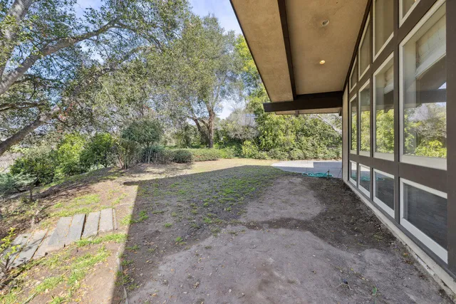 a view of a yard in front of a house