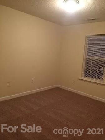 1203 Helms Road Charlotte, NC 28214 - Photo 4 of 5 a view of an empty room
