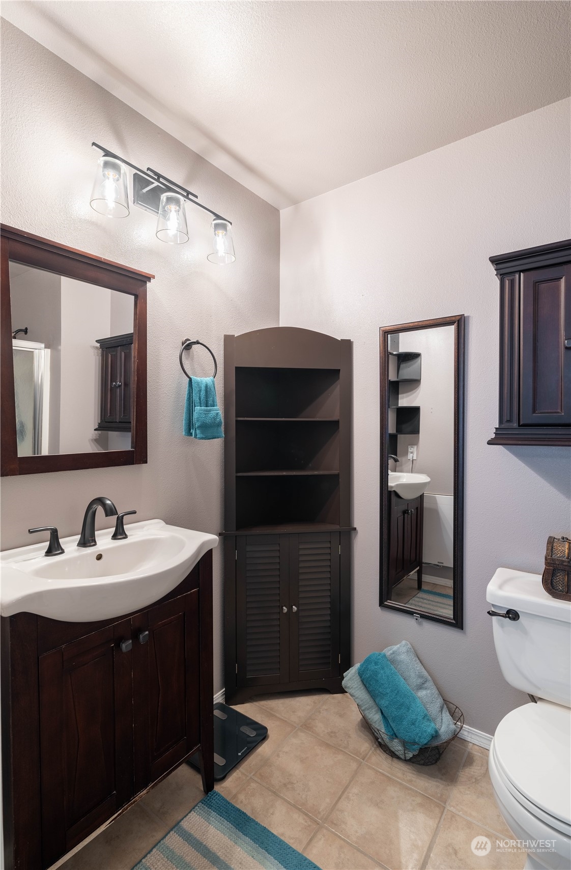 18940 Melon Street Southwest Rochester, WA 98579 - Photo 14 of 39 a bathroom with a sink toilet and shower