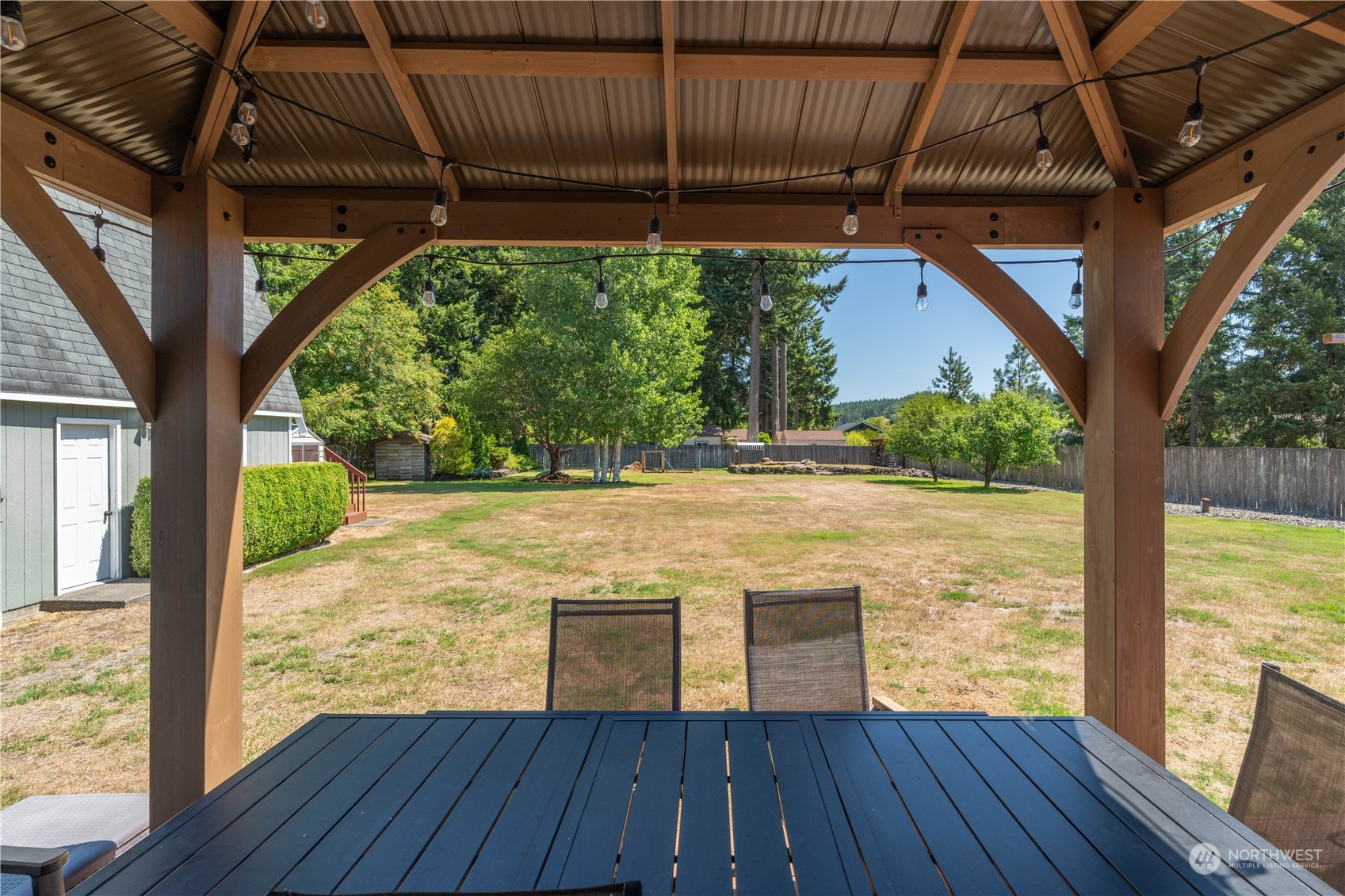 18940 Melon Street Southwest Rochester, WA 98579 - Photo 21 of 39 a view of outdoor space with wooden deck