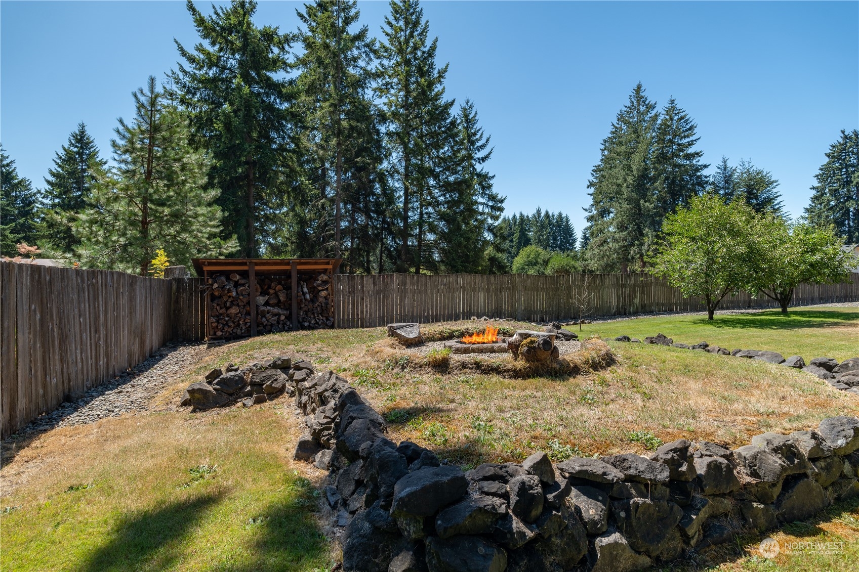 18940 Melon Street Southwest Rochester, WA 98579 - Photo 35 of 39 a view of a backyard with swimming pool