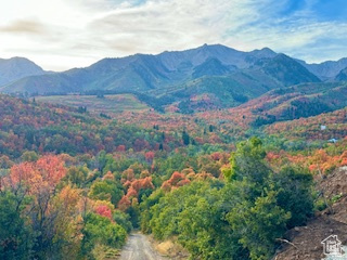 6909 East Spring Drive, Unit 19 Springville, UT 84663 - Photo 85 of 118 Expansive mountainous terrain with vibrant autumn foliage