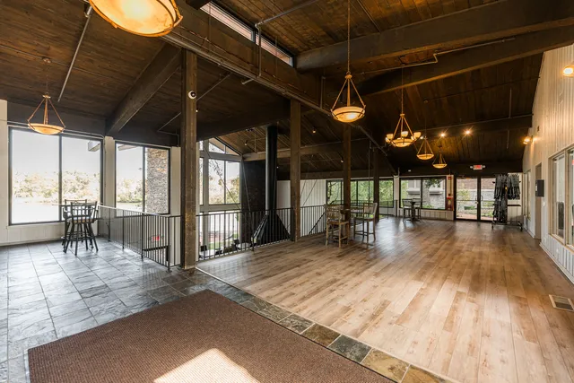 a view of a swimming pool with a patio
