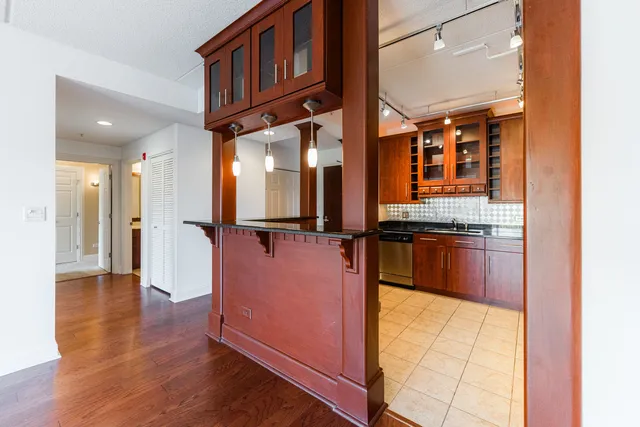 a view of kitchen with utility and stainless steel appliances