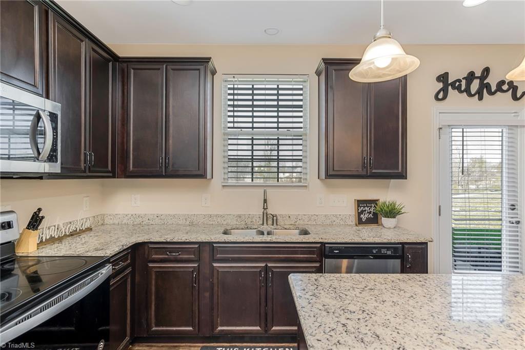 3637 Link Road Greensboro, NC 27405 - Photo 11 of 36 Lots of Natural Light in this Beautiful and Practical Kitchen.