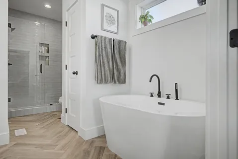 a bathroom with a sink and shower