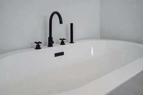 a close view of a faucet a sink and a tap