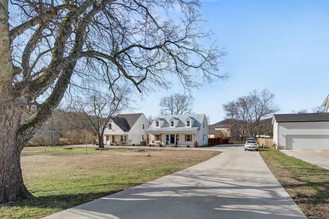 a view of street with houses