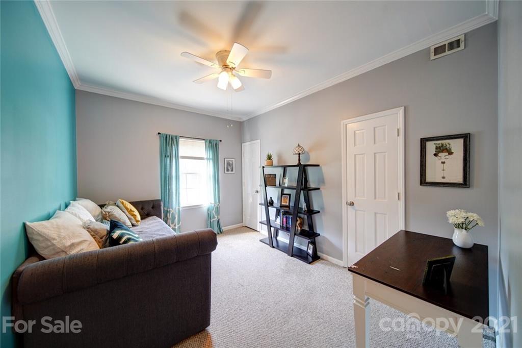 1014 Queens Road Charlotte, NC 28207 - Photo 8 of 18 a living room with furniture and a window