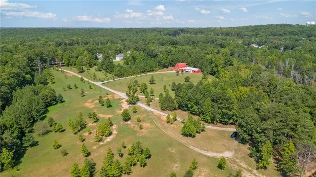 a view of a lake with a big yard