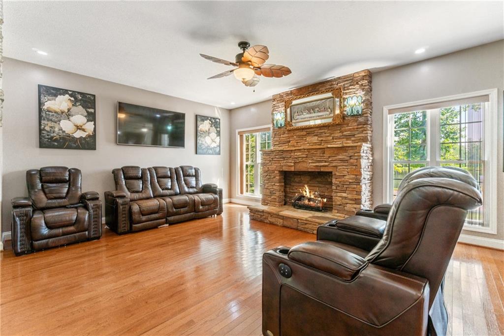 1401 Rainey Road Temple, GA 30179 - Photo 44 of 58 a living room with furniture and a fireplace