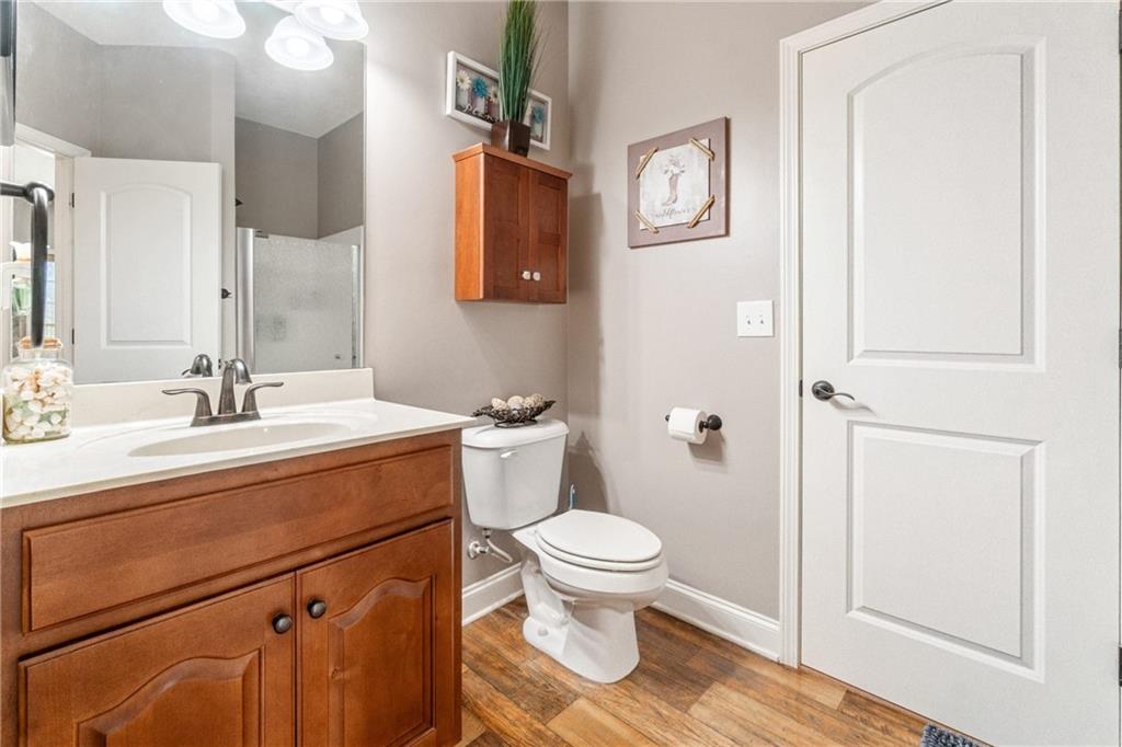 1401 Rainey Road Temple, GA 30179 - Photo 45 of 58 a bathroom with a sink toilet and shower
