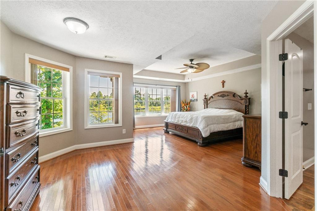 1401 Rainey Road Temple, GA 30179 - Photo 57 of 58 a bedroom with a bed and a large window