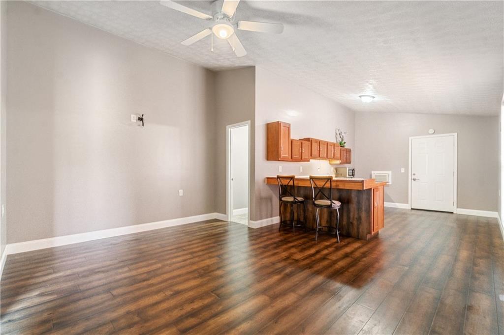 1401 Rainey Road Temple, GA 30179 - Photo 58 of 58 a view of a dining room with furniture window and wooden floor