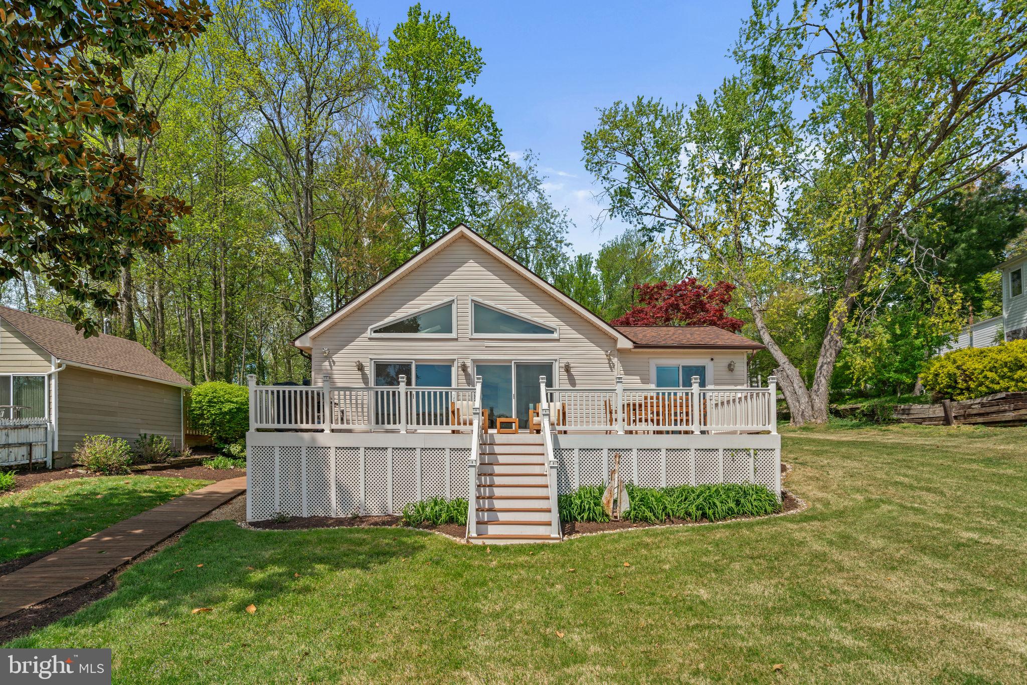 25 Leeland Road Edgewater, MD 21037 - Photo 42 of 48 a view of a house with a yard and deck