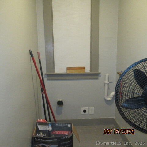 67 Burlington Avenue, Unit 69 Bristol, CT 06010 - Photo 14 of 15 a view of a hallway with furniture