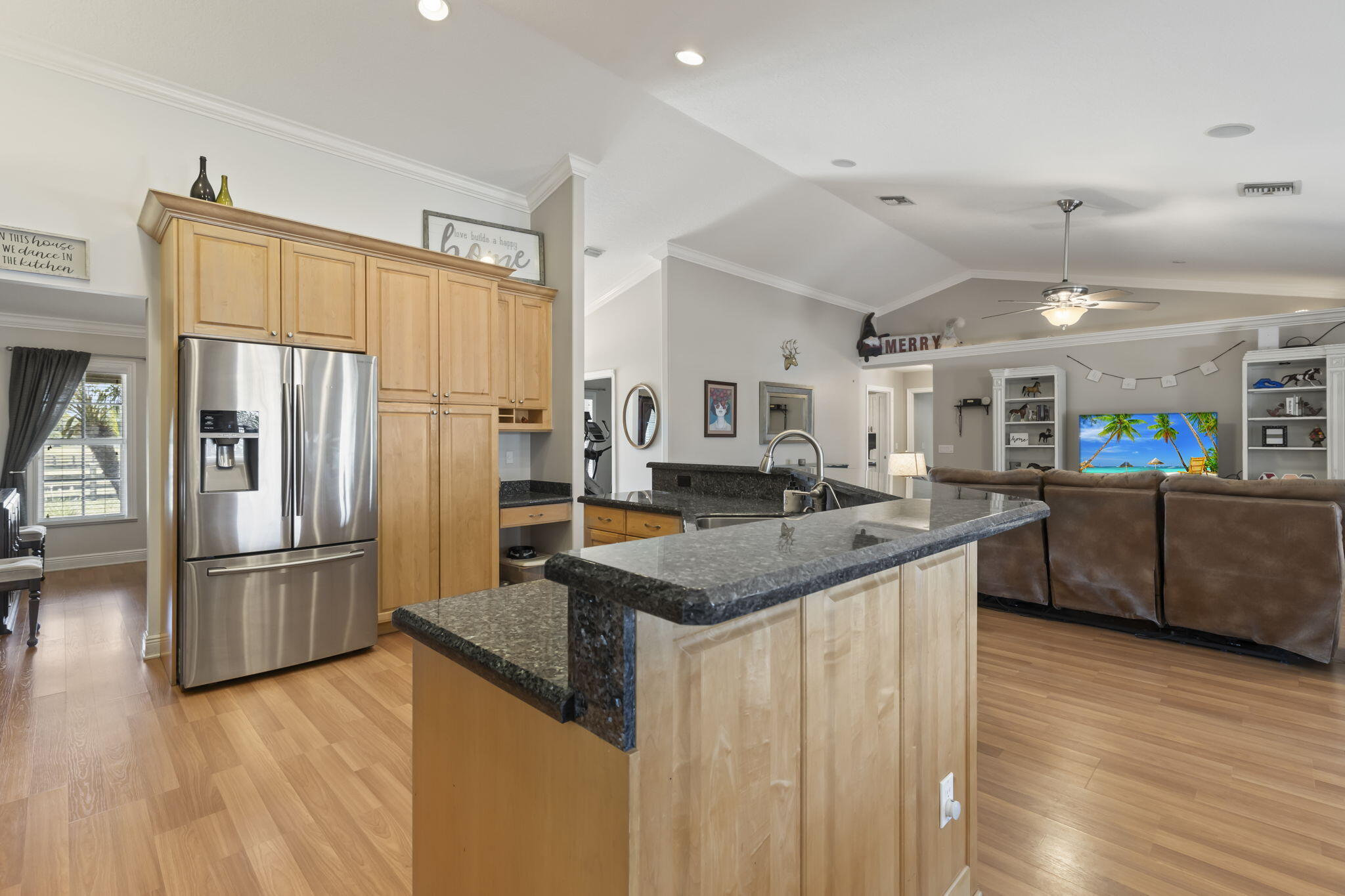 9850 Muller Road Fort Pierce, FL 34945 - Photo 12 of 52 a kitchen with counter top space and stainless steel appliances