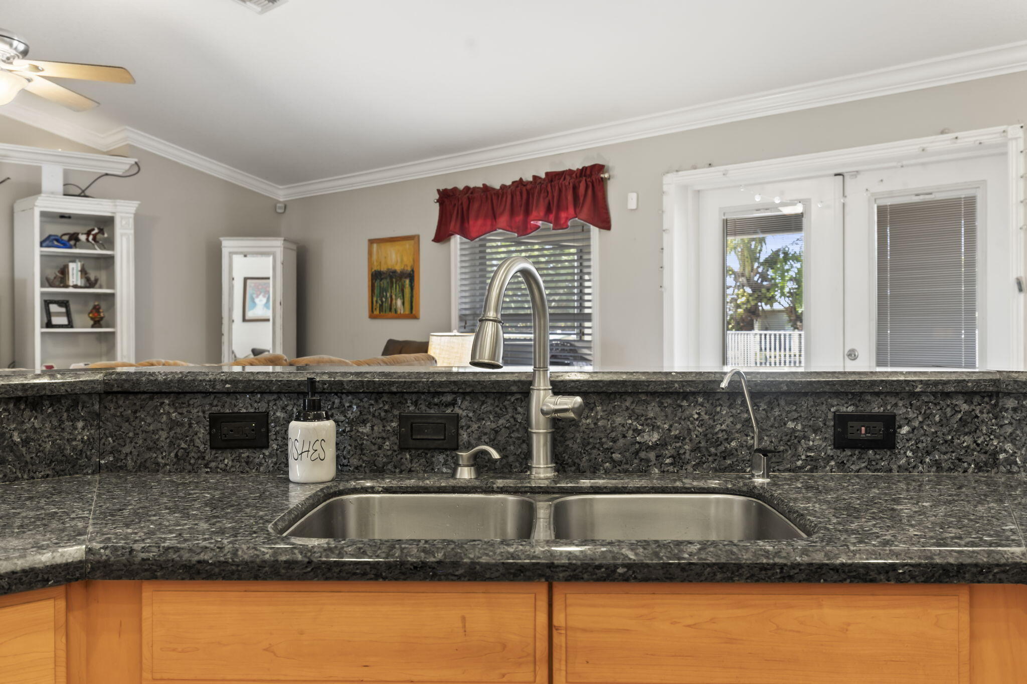 9850 Muller Road Fort Pierce, FL 34945 - Photo 14 of 52 a kitchen with granite countertop a sink and a granite counter tops