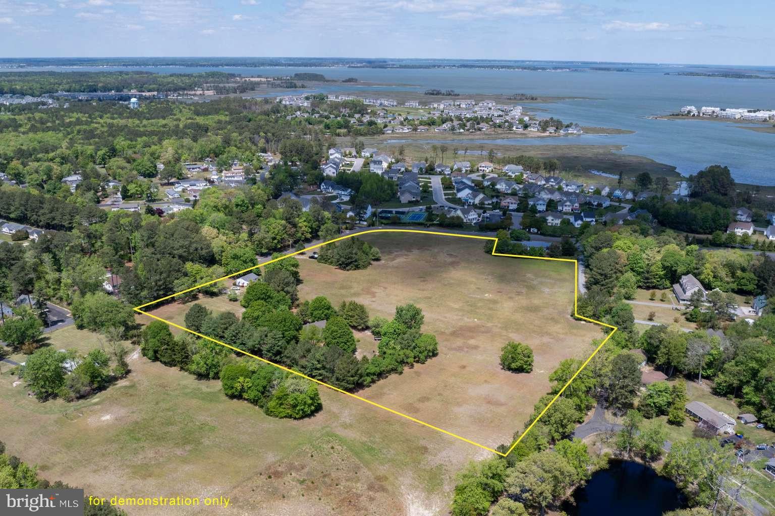 37186 Clubhouse Road Ocean View, DE 19970 - Photo 4 of 14 a view of a lake with a city