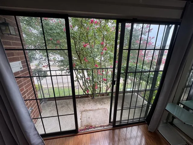a bathroom with a toilet a sink and a mirror