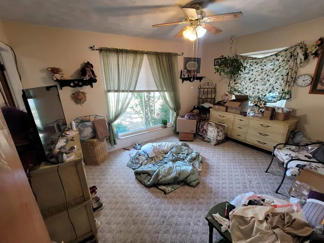 a room with furniture and a window