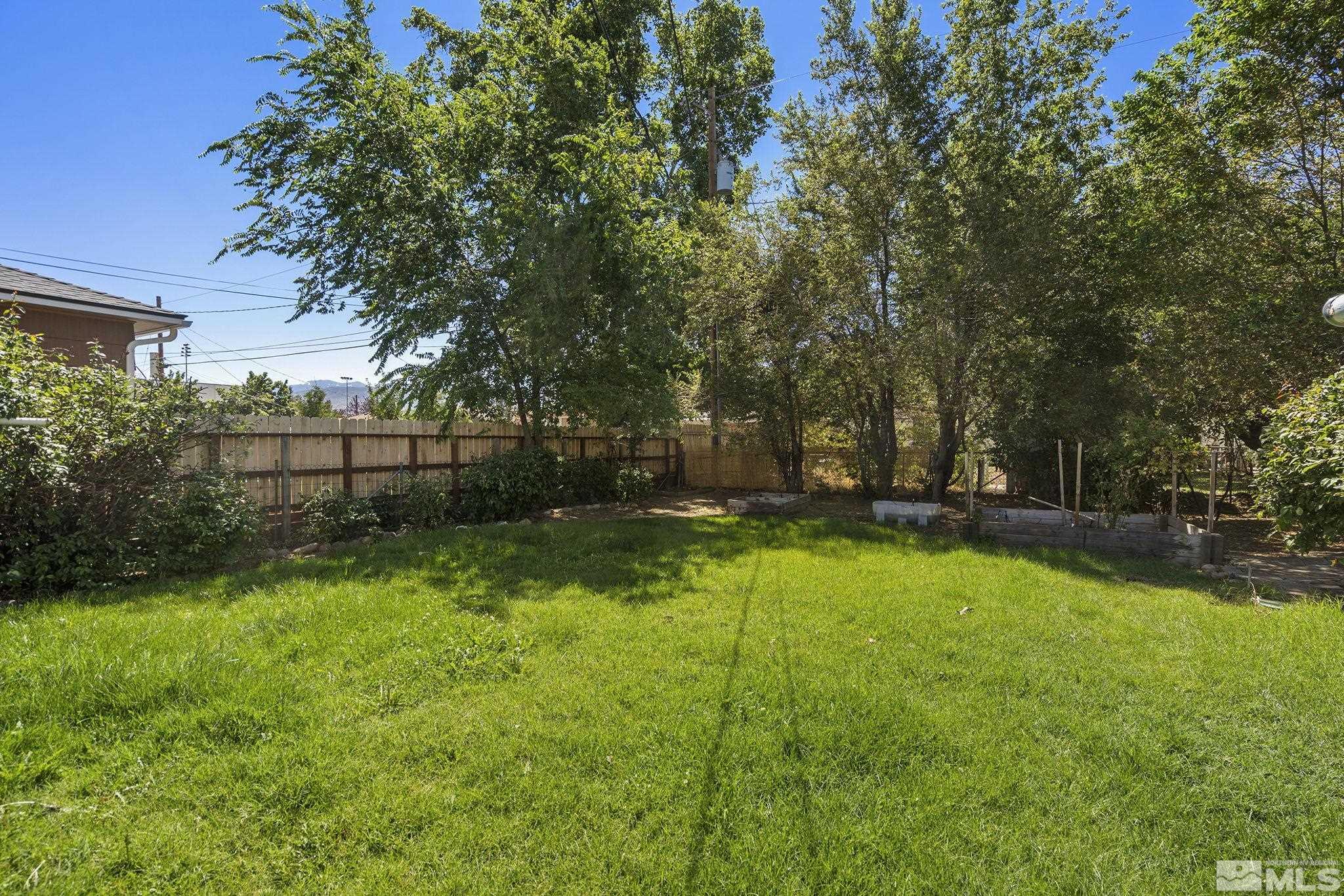 971 Lester Avenue Reno, NV 89502 - Photo 13 of 15 a view of a backyard with a garden