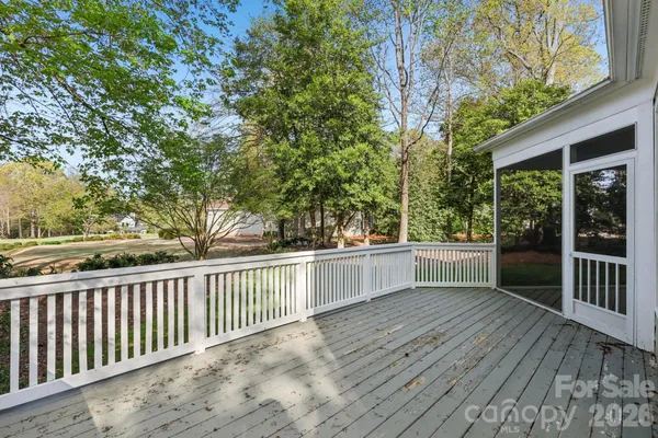 a view of porch with wooden floor and fence