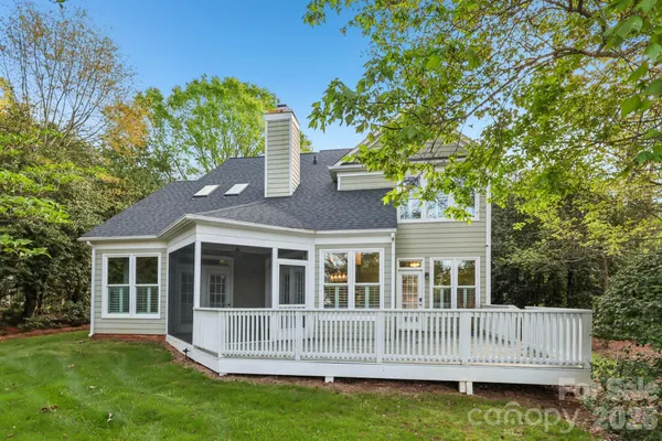 a view of house with a garden